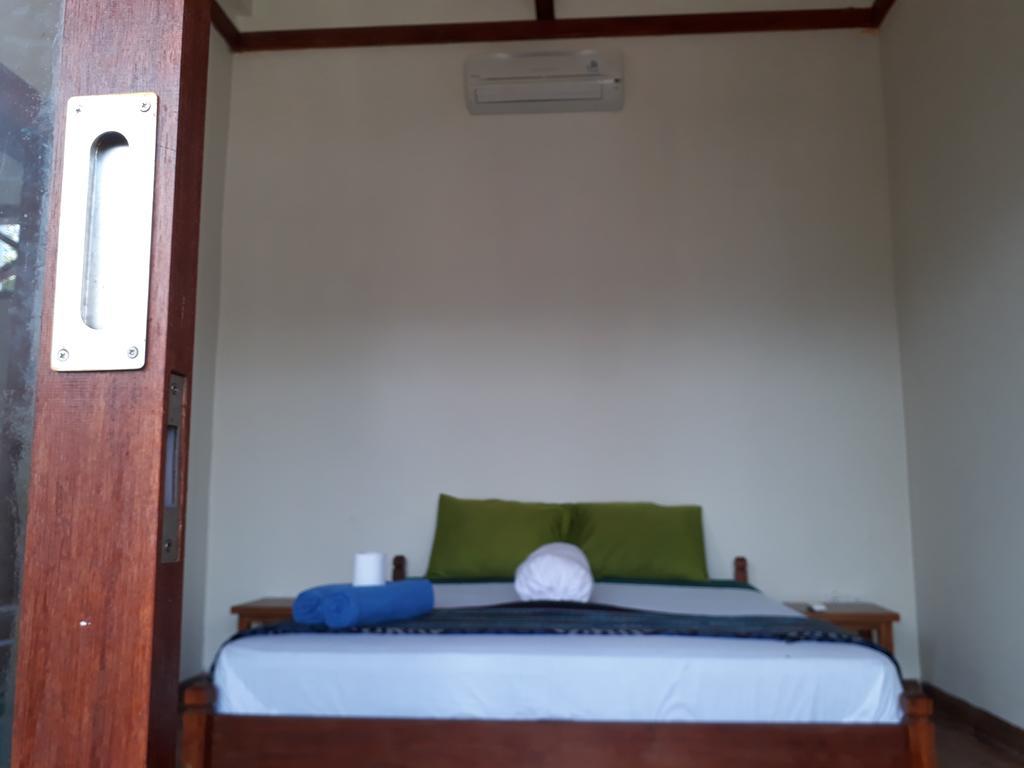 Kuta Bay Homestay Oda fotoğraf